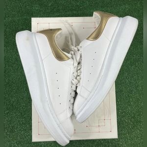 Alexander Mcqueen mens over sized sneaker White/ Gold sz 12